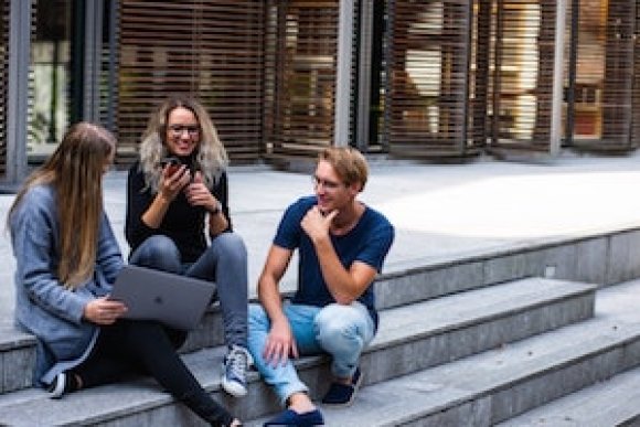 students sitting on stairs